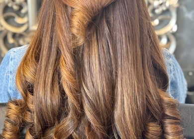 Elegant curls expertly styled at Leila Keogh Hair, Royal Leamington Spa, England, GB.