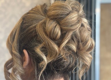 Intricate updo hairstyle crafted at Leila Keogh Hair, Royal Leamington Spa, England, GB.