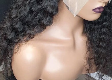 Curly wig displayed at Bozenga Beauty, Manchester, England, GB, showcasing premium hair texture and style.