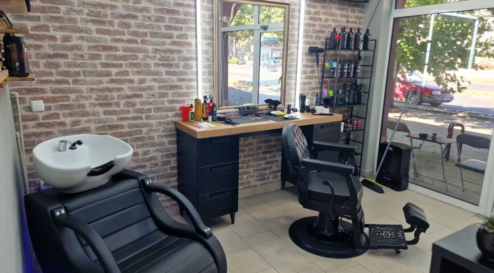 Modern GP Barber Studio in Harmanli, Haskovo, BG with sleek chairs and styling products.