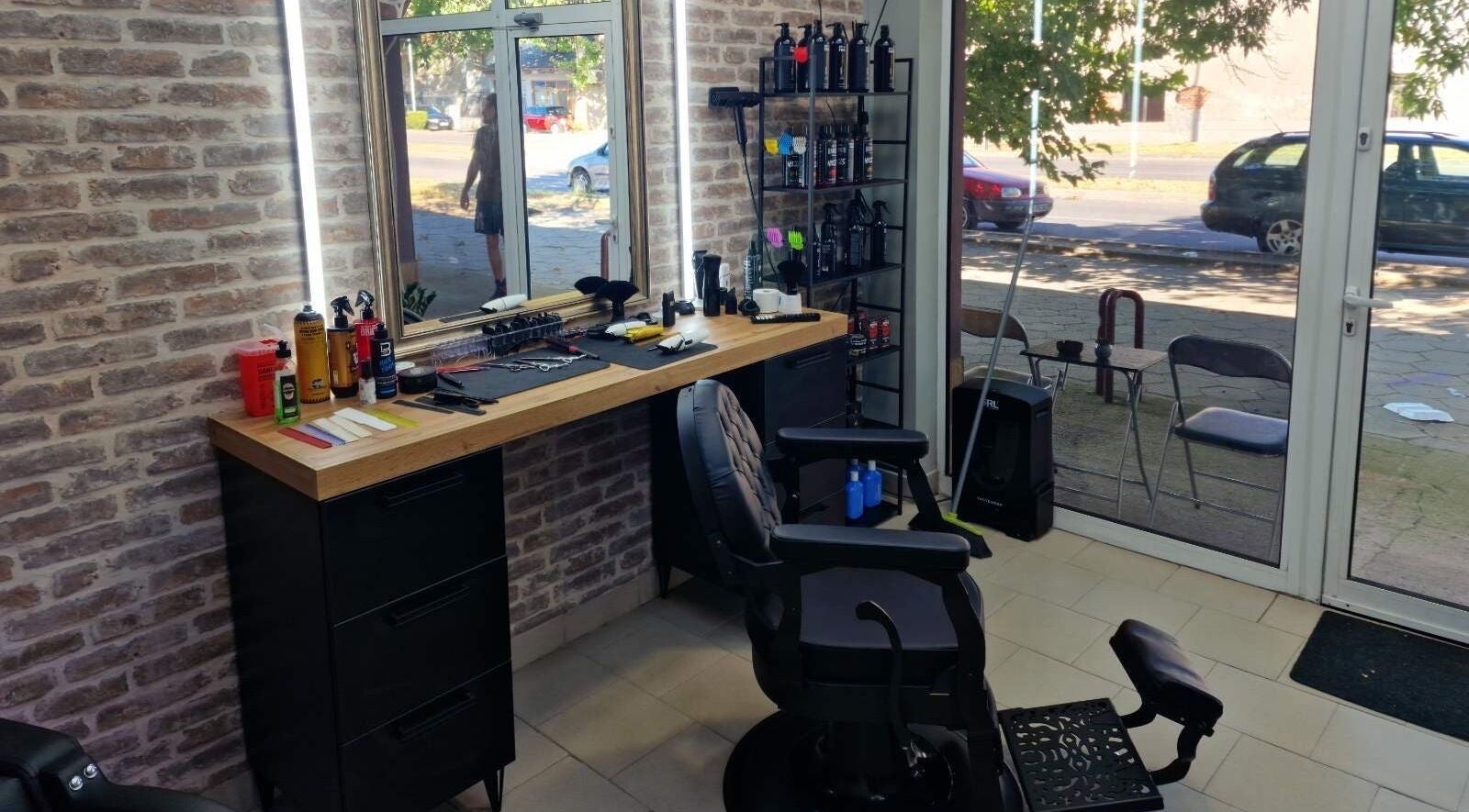 GP Barber Studio in Harmanli, Haskovo, BG, featuring a modern styling area with tools and products.