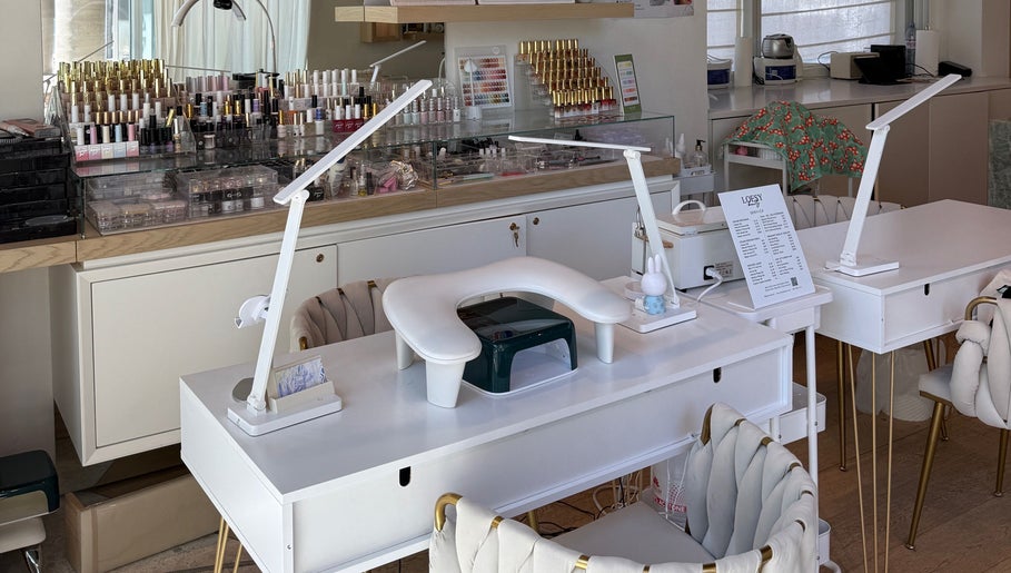 Modern nail station at MueseoYu Nail, Vancouver, British Columbia, CA, showcasing elegant design and equipment.