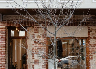 Charming brick facade of Kink in Victor Harbor, South Australia, AU, reflecting a warm, welcoming atmosphere.