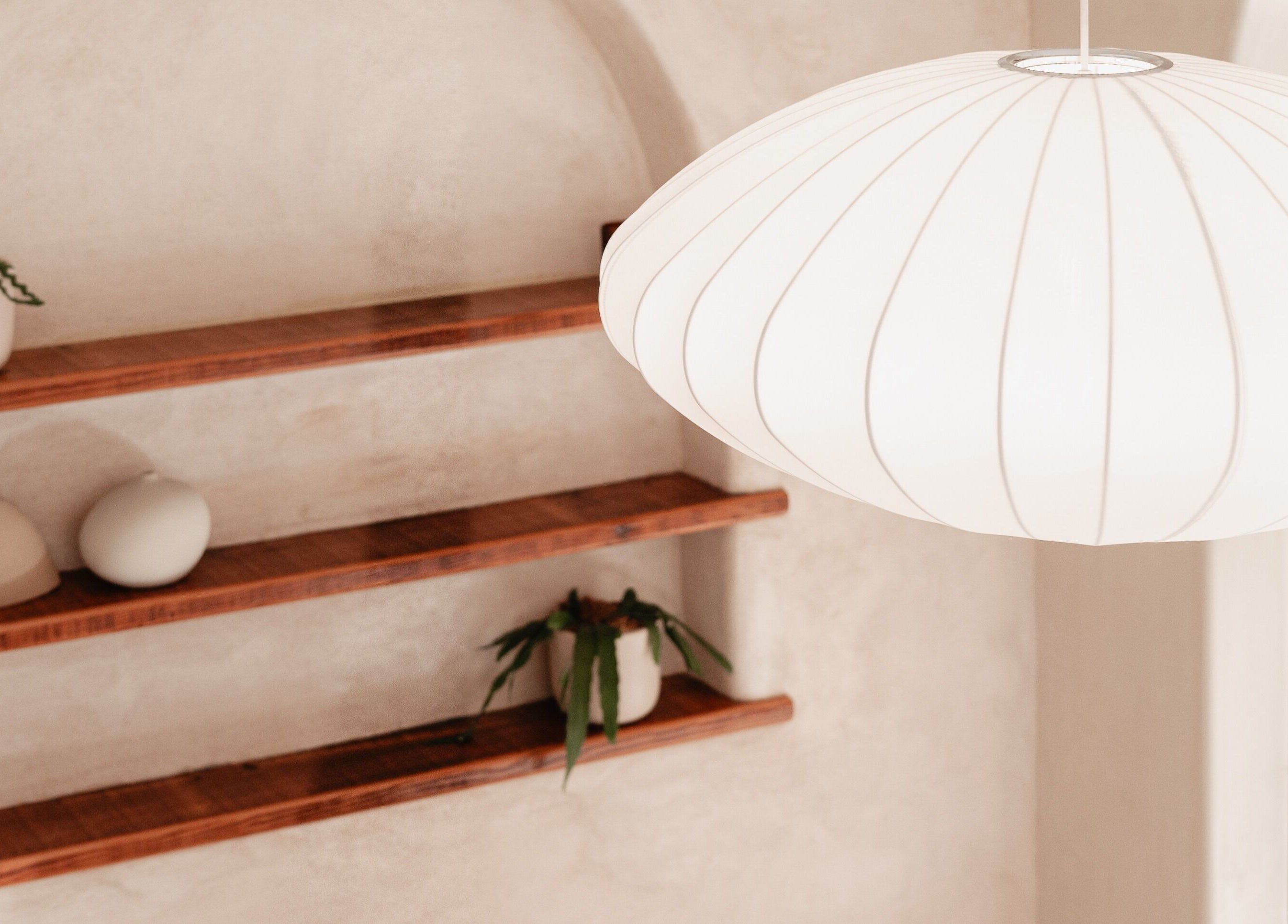 Elegant wooden shelves and hanging light at Kink, Victor Harbor, South Australia, AU.