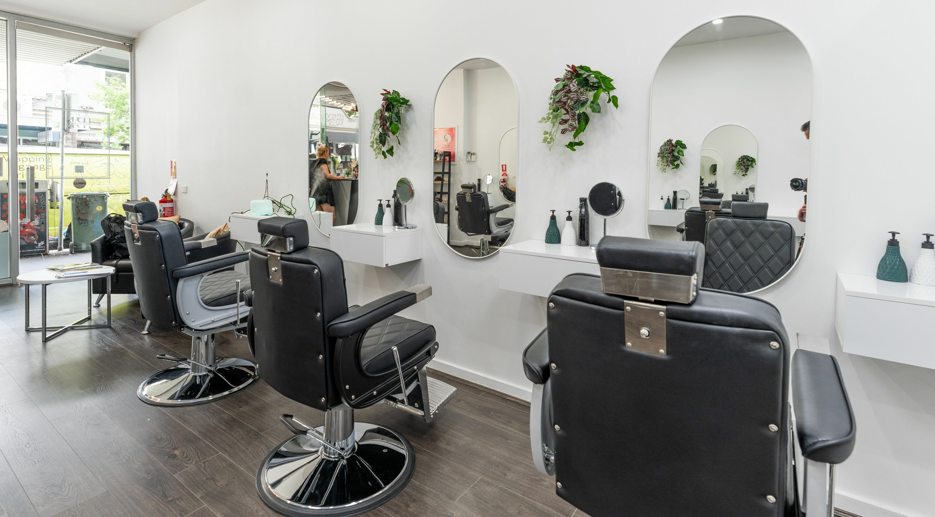 Modern salon chairs and mirrors at Ibrow & Lashes - Richmond, Richmond, Victoria, AU.