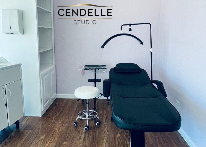 Elegant beauty room at Cendelle, San Antonio, Texas, US featuring a modern treatment bed and minimalist decor.