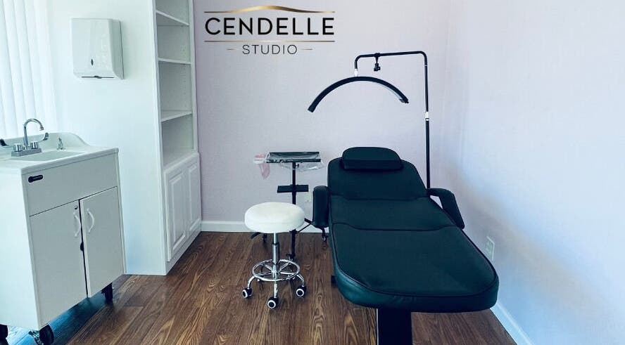 Elegant beauty room at Cendelle, San Antonio, Texas, US featuring a modern treatment bed and minimalist decor.