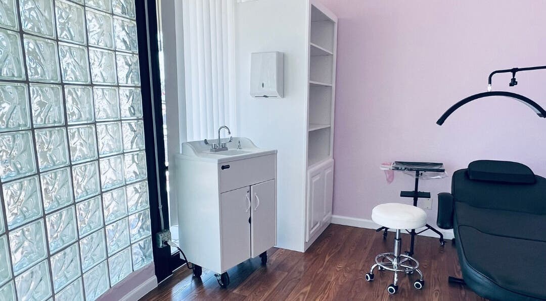 Modern beauty treatment room at Cendelle in San Antonio, Texas, featuring sleek furnishings and a serene atmosphere.