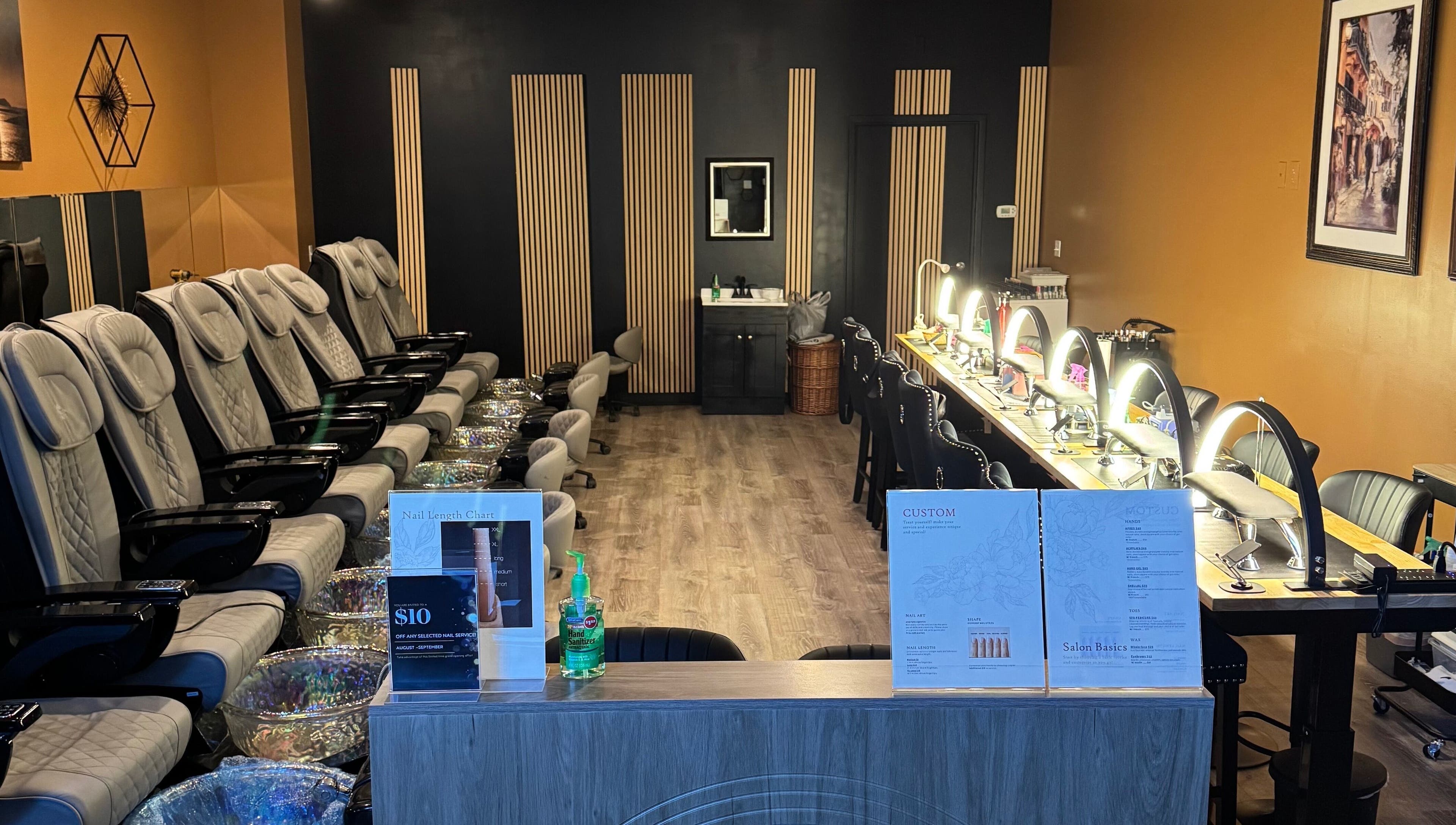 Interior of Lamour Nails in Orem, Utah, US featuring luxury pedicure chairs and manicure stations.