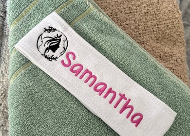 Embroidered towels at Samantha’s head spa ltd in Nottingham, England, GB, showcasing spa luxury.