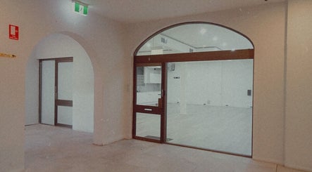 Entrance view of The Black Rabbit skin clinic in Newcastle, New South Wales, AU with modern interior design.
