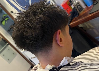 Trendy haircut at GCutz, Margaret River, Western Australia, AU showcasing a modern hairstyle.