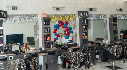 Stylish salon interior at EKI ROYAL BEAUTY LOUNGE, Edmonton, Alberta, CA with decorative mirrors and balloons.