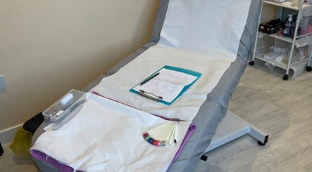 Treatment bed at Orange Blossom Beauty in Park Gate, England, GB, ready for a relaxing wellness session.