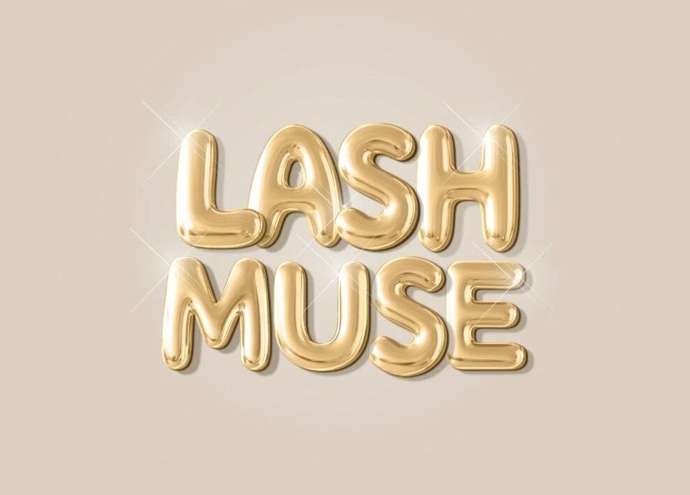 Elegant gold 'LashMuse' logo showcasing beauty and wellness in Tweedbank, Scotland, GB.