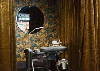 Luxury spa treatment room at Alchemy & I, Palmerston North, Manawatū-whanganui Region, NZ with velvet drapes.