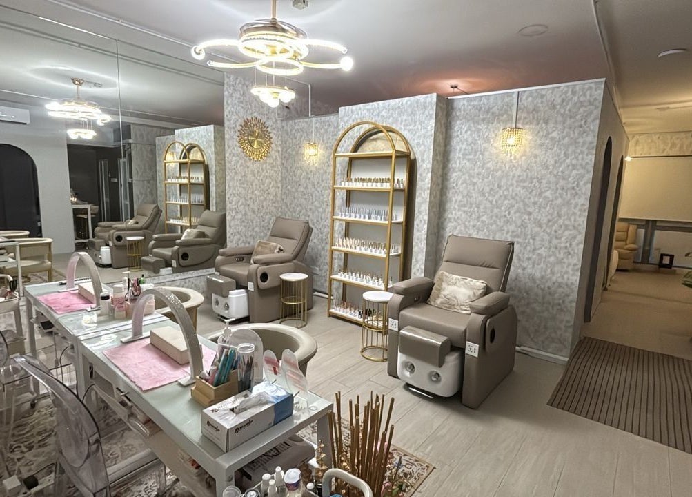An elegant salon interior at Lashthetic8Bar, Kuala Lumpur, Wilayah Persekutuan Kuala Lumpur, MY, showcases plush chairs.