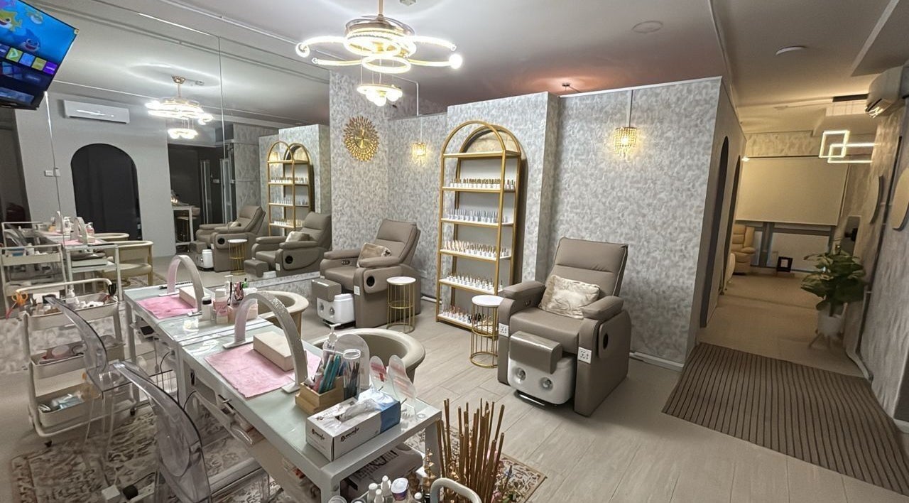 An elegant salon interior at Lashthetic8Bar, Kuala Lumpur, Wilayah Persekutuan Kuala Lumpur, MY, showcases plush chairs.
