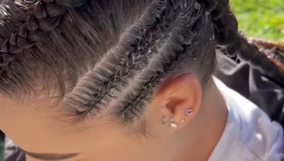 Close-up of stylish braids at Ataahua Braids, Whanganui, NZ, showcasing intricate hair artistry.