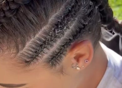 Close-up of stylish braids at Ataahua Braids, Whanganui, NZ, showcasing intricate hair artistry.