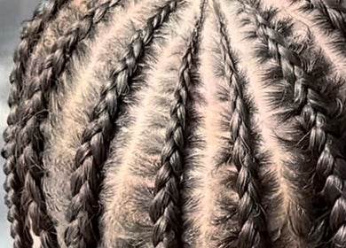 Intricate braids styled at Ataahua Braids, Whanganui, NZ, showcasing expert hair artistry.