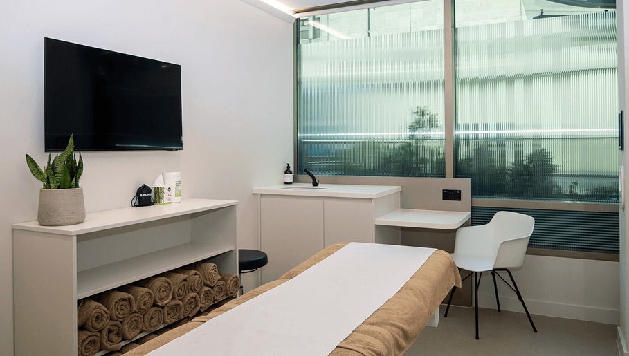 Relaxing treatment room in OA London, features modern decor and natural light in London, England, GB.