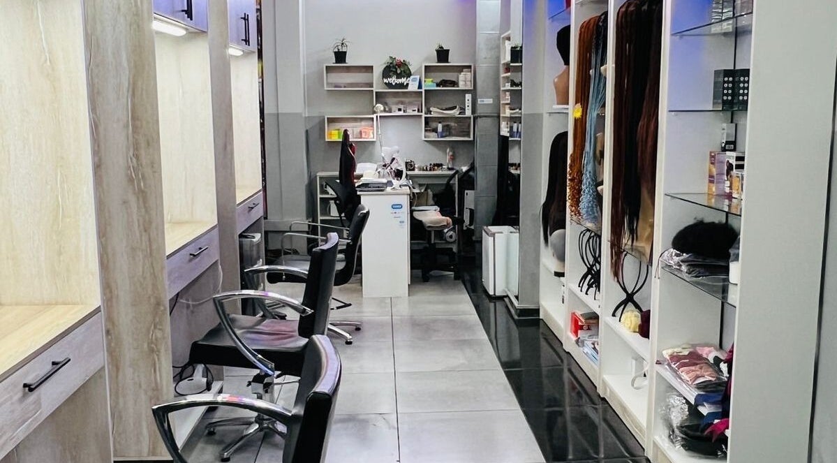 Modern interior of Evolutio Hair Salon, Cape Town, featuring sleek styling stations and hair product displays.