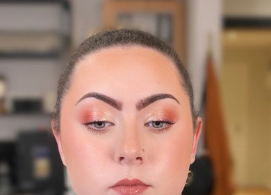 Close-up of stunning makeup by Highland Glow Artistry in Oban, Scotland, GB showcasing luminous eye shadows.