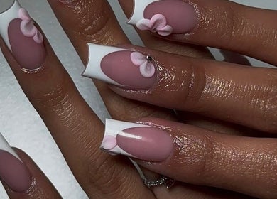 Elegant floral nail art at Blissbeauty Glam Studio, East London, Eastern Cape, ZA for a chic manicure.