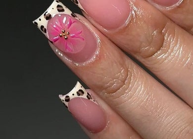 Elegant nail design featuring floral art at Blissbeauty Glam Studio, East London, Eastern Cape, ZA.