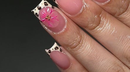 Elegant nail design featuring floral art at Blissbeauty Glam Studio, East London, Eastern Cape, ZA.