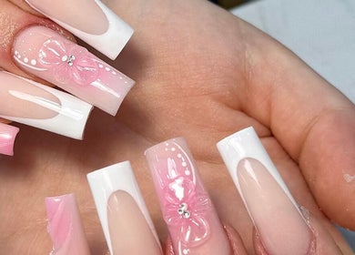 Elegant pink and white nail design at Tullamore Butterfly Beauty Lounge, Tullamore, County Offaly, IE.