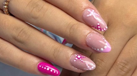 Elegant pink and white nail art at Tullamore Butterfly Beauty Lounge, Tullamore, County Offaly, IE.