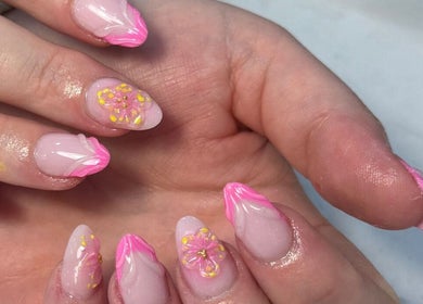 Floral nail art at Tullamore Butterfly Beauty Lounge in Tullamore, County Offaly, IE showcases pink petals.