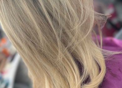 Stylish blonde hair highlighting service at Dynamix Hair Salon, Carluke, Scotland, GB.