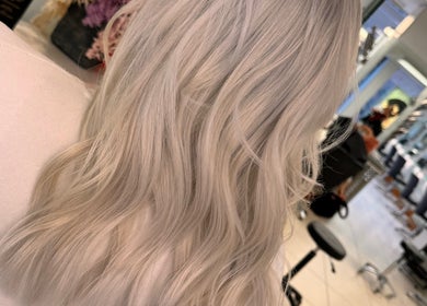 Silky blonde hair waves styled at Dynamix Hair Salon, Carluke, Scotland, GB.