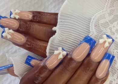 Blue and nude nails with bows at GrapUglow Beauty Academy, Benoni, Gauteng, ZA.