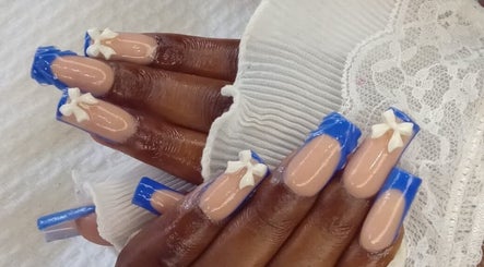 Blue and nude nails with bows at GrapUglow Beauty Academy, Benoni, Gauteng, ZA.