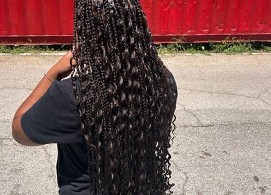 Intricate braids and curls at Cr_.hairstyles in Willemstad, Curaçao, CW, showcasing exquisite hair styling.