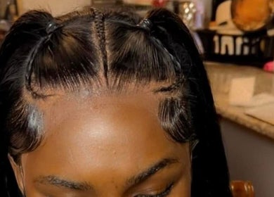 Intricate braided hairstyle by Beautified By Ashiunna in Yazoo City, Mississippi, US.