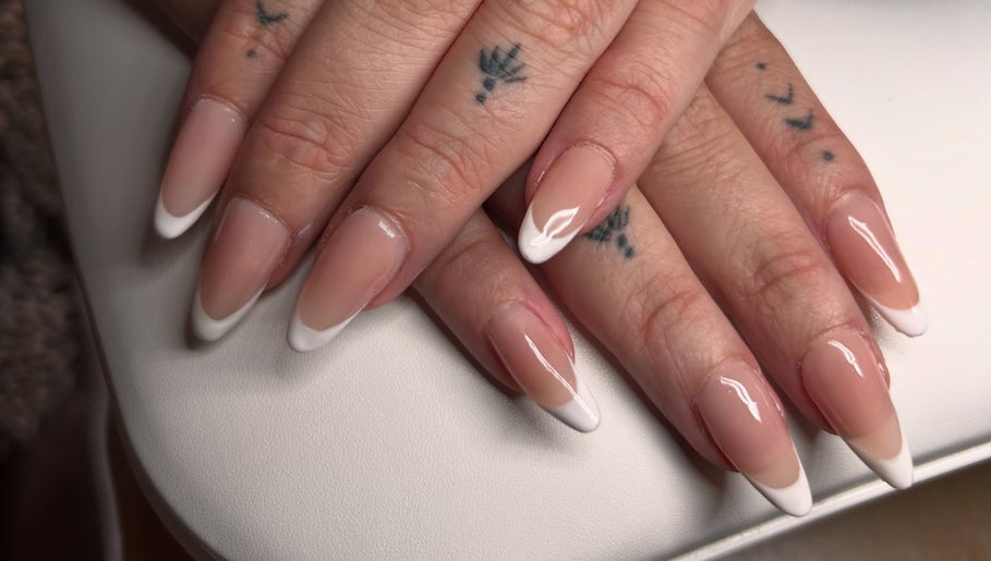 Sophisticated French tip nails at Nails by Kula, Liskeard, England, GB showcasing natural elegance.