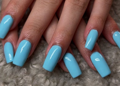 Elegant aqua blue manicured nails at Nails by Kula, Liskeard, England, GB.