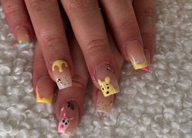 Whimsical cartoon nail art design at Nails by Kula, Liskeard, England, GB showcasing colorful creativity.