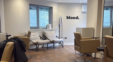 Elegant interior of Kayleigh Spencer Hair in Southampton, England, GB, featuring plush chairs and modern decor.