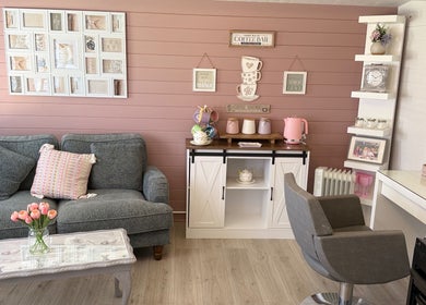 Charming interior of Pretty Hair Cabin in Stockton-on-Tees, England, with plush seating and decor.