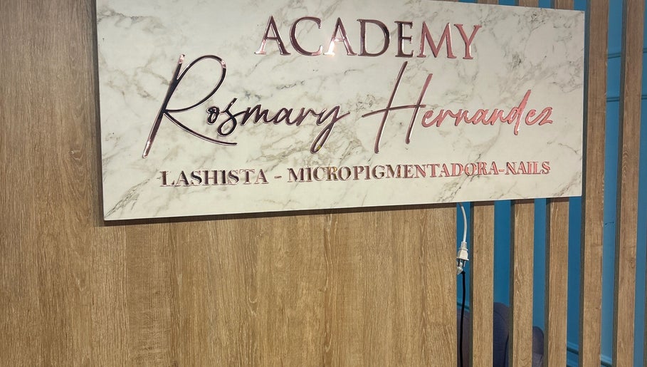 Sign of Academy Rosmary Hernandez showcasing services like lashista and nails in Kralendijk, Bonaire, BQ.