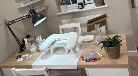 Nail station at Kayas Beauty Room, Stevenage, England, GB with manicure tools and plant decor.