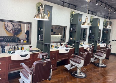 Stylish grooming chairs at The Wolfs Grooming Lounge Hadley Wood, Barnet, England, GB, embodying luxury and elegance.