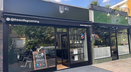 The Wolfs Grooming Lounge Hadley Wood exterior in Barnet, England, GB, showcasing a stylish, modern facade.