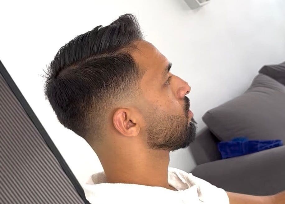 Sleek haircut at Ayoub Hair Salon in Tétouan, Tanger-tétouan-al Hoceima, MA; showcasing a modern fade style.